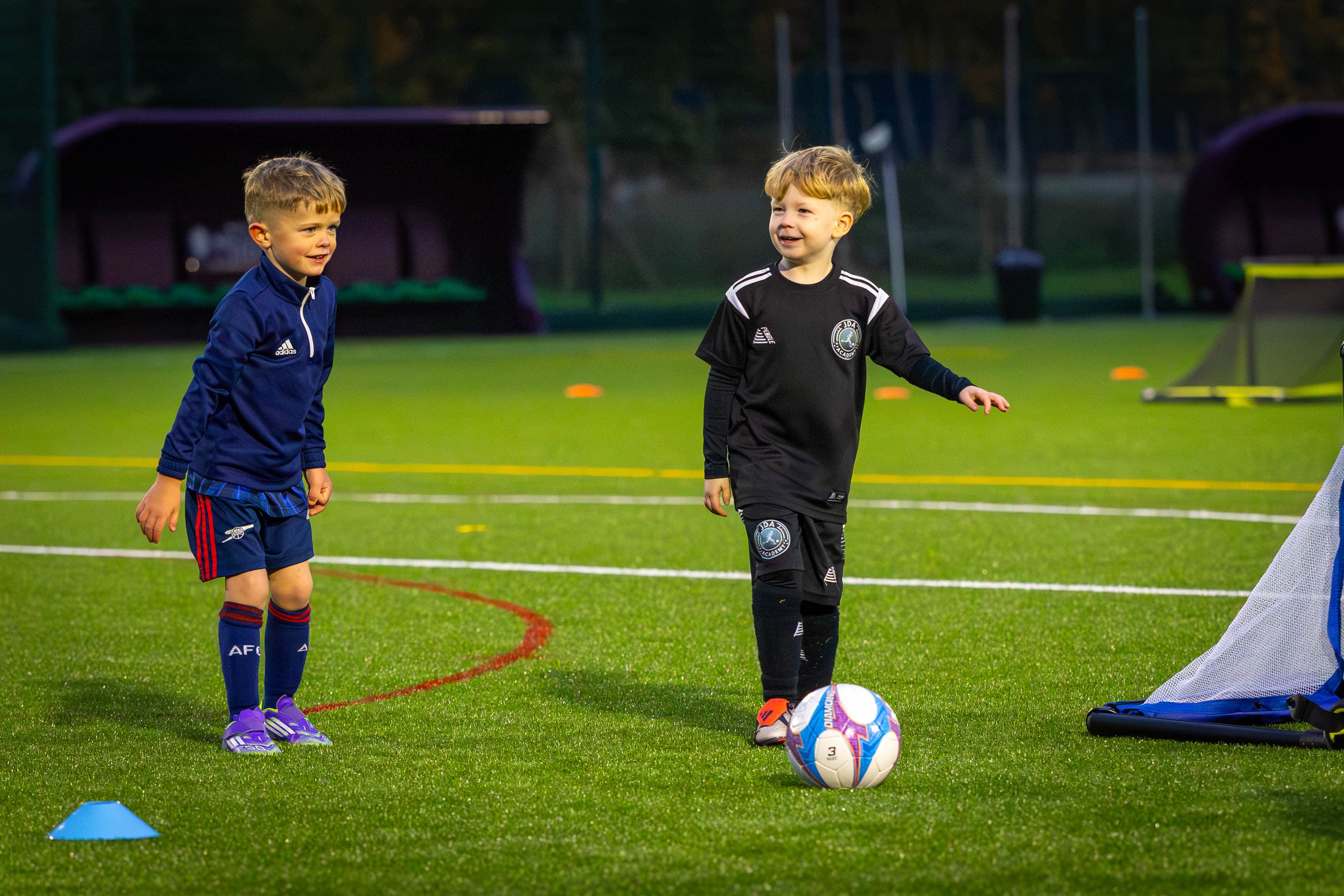 A young JDA Saturday Soccer School player enjoying a Saturday session
